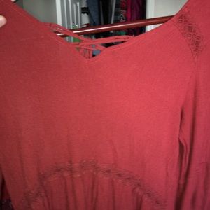 orange blouse with lace detailing